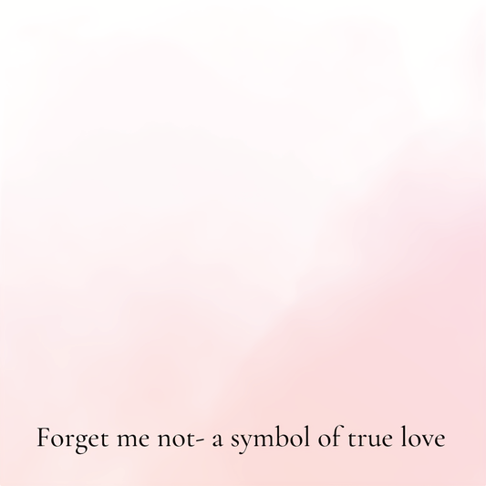 Pink and white necklace card reading "Forget me not - a symbol of true love"