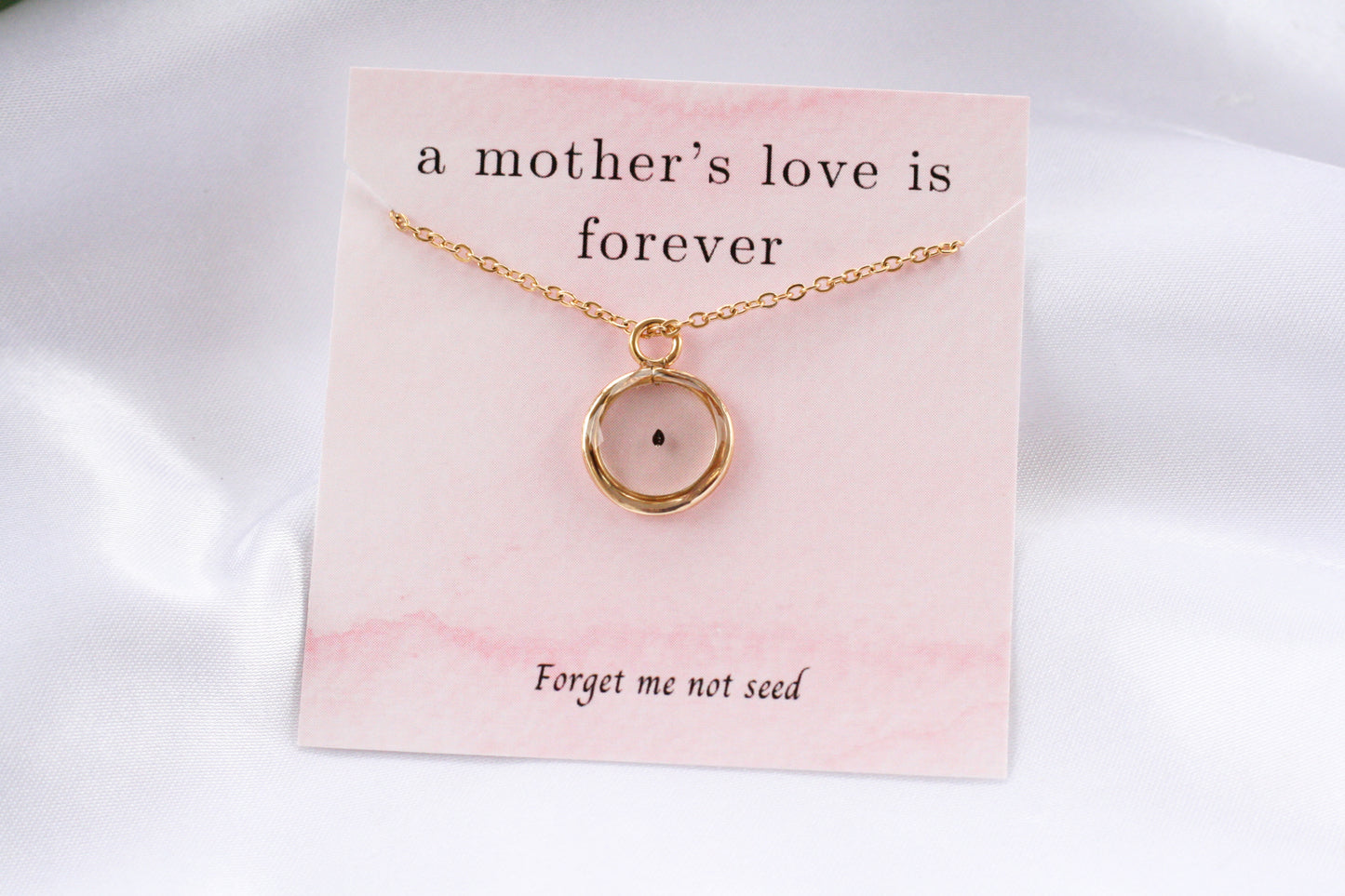 Forget me not seed necklace