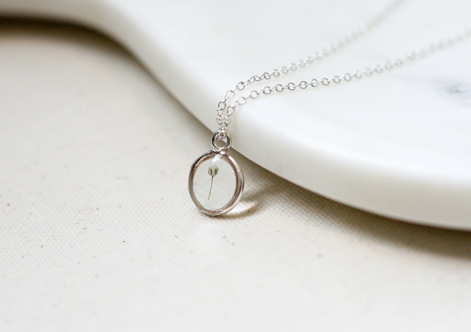 one piece of babys breath in a sterling silver pendant necklace