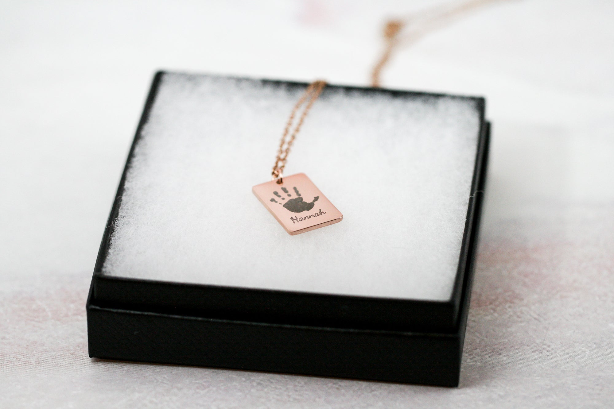 Handprint necklace in rose gold