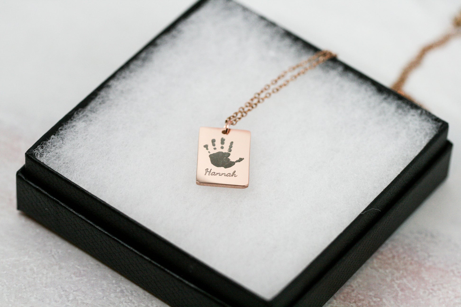 Handprint necklace in rose gold