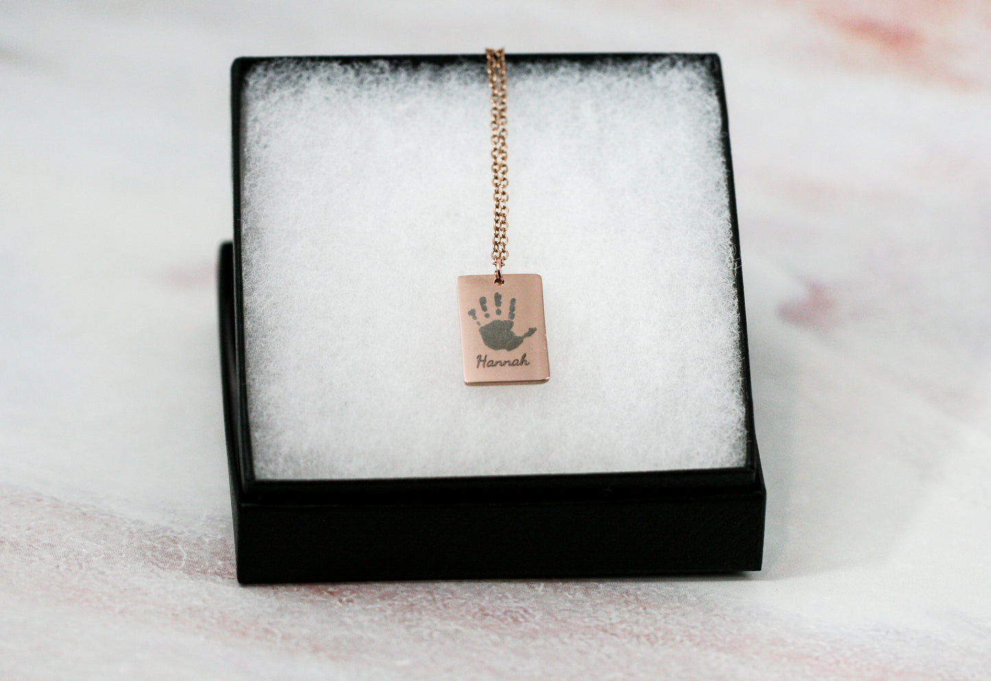 Handprint necklace in rose gold