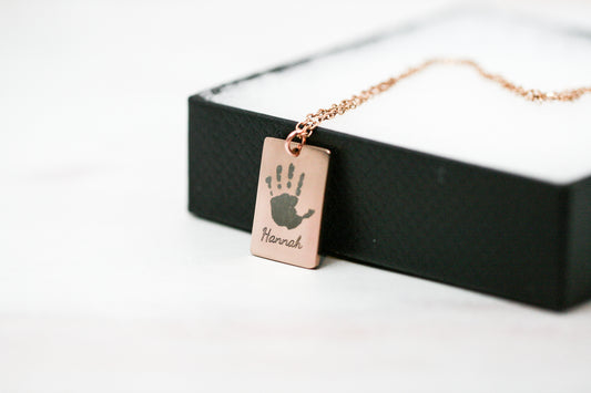 Handprint necklace in rose gold