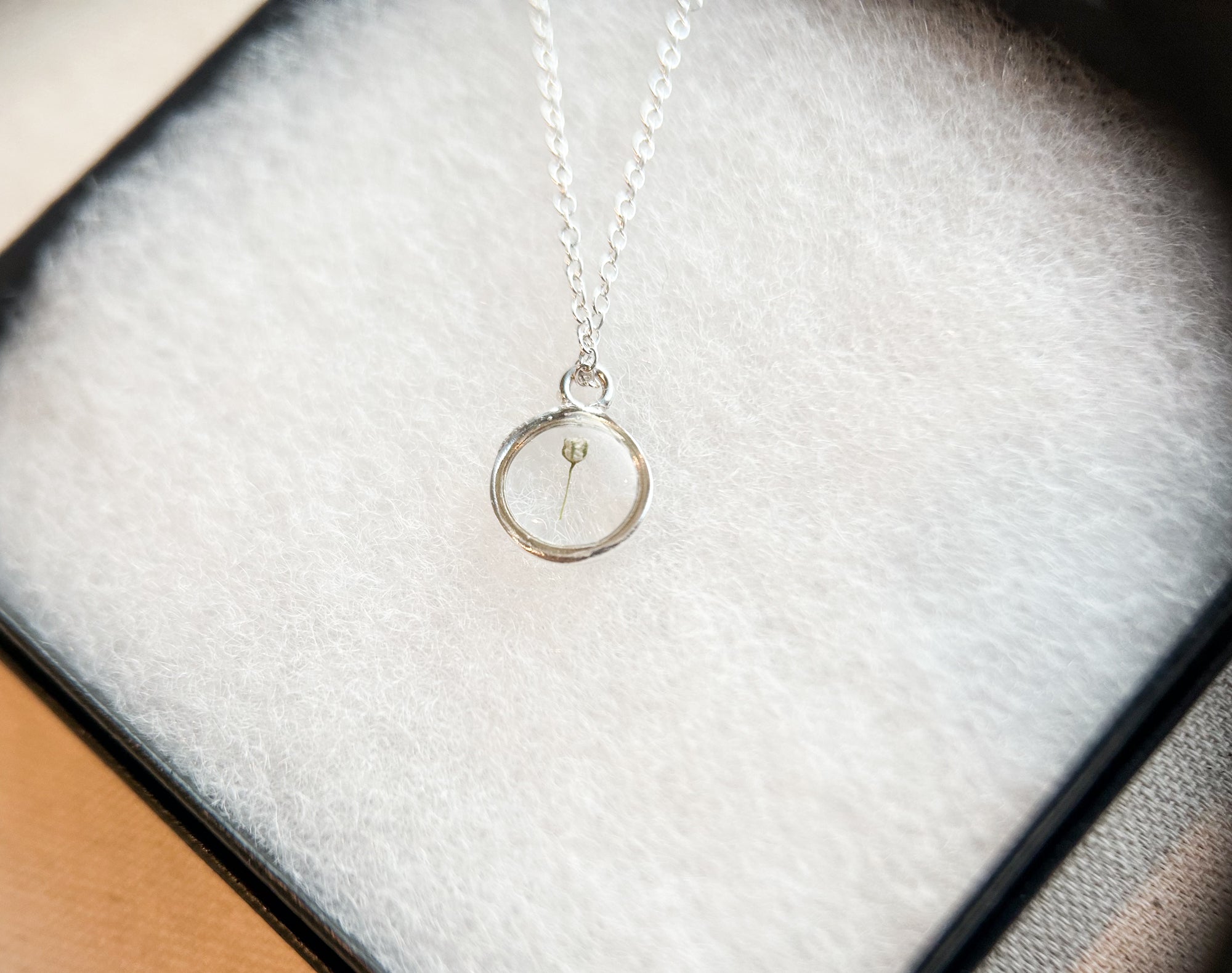 one piece of babys breath in a sterling silver pendant necklace 