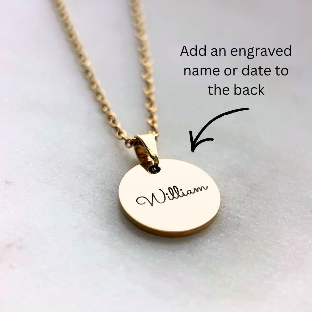 Rest of the Nest Personalized engraved name on the back of the necklace.