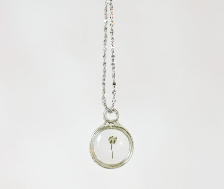 one piece of babys breath in a sterling silver pendant necklace