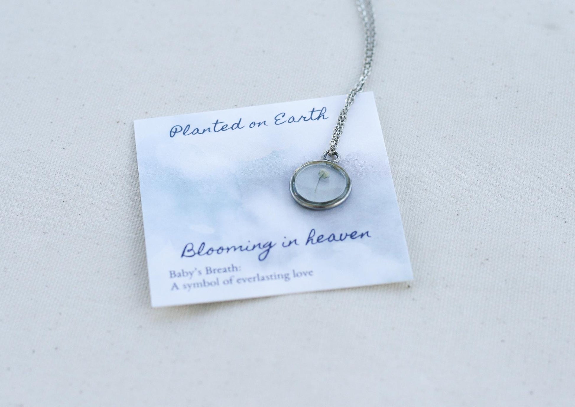 babys breath necklace with planted on earth blooming in heaven card