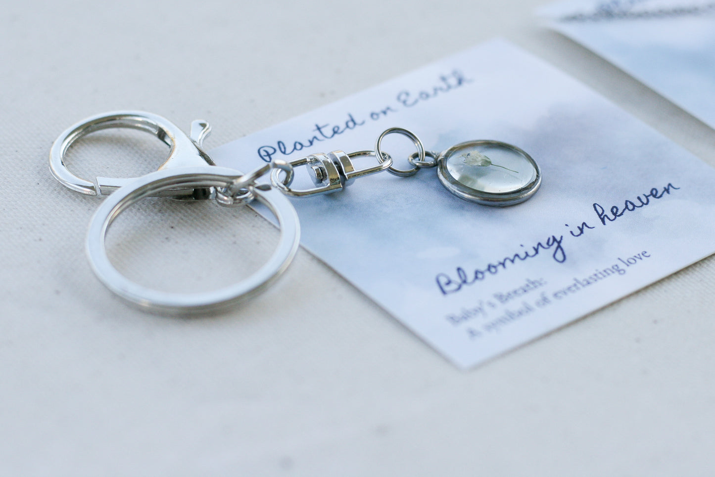 up close view of a babys breath keychain 