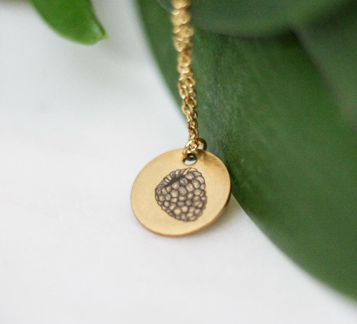 raspberry engraved onto gold pendant necklace